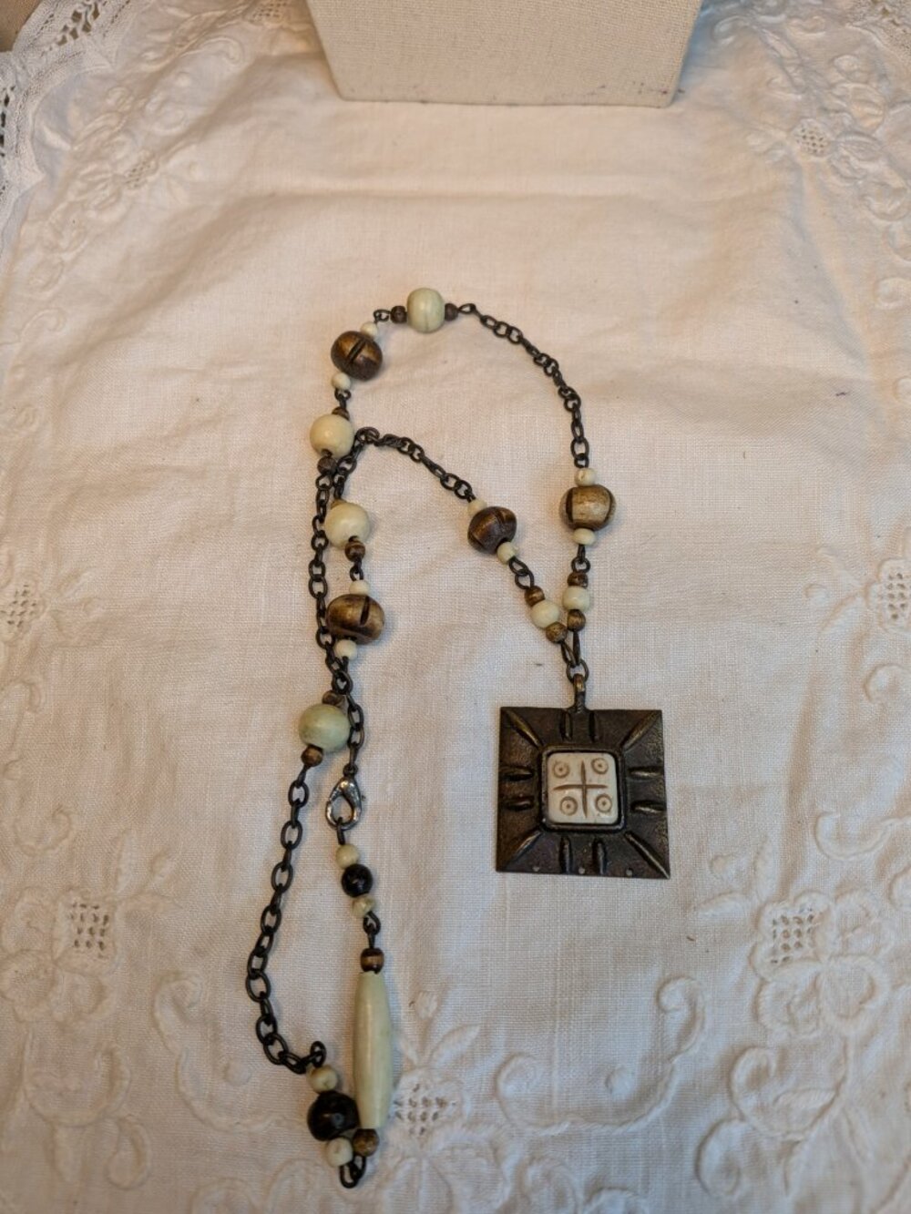 Handcrafted Tribal‑Style Necklace – Bronze Pendant & Bone Beads (20")